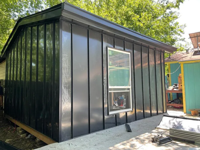 Black standing seam metal wall panels for Metal Roof Installation in Garden City